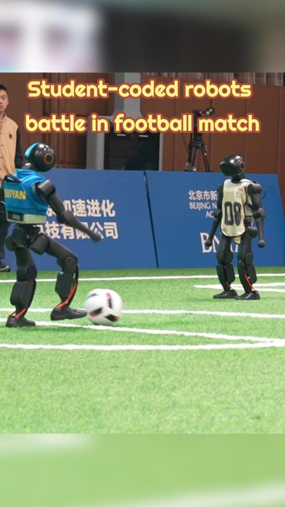 Student-coded humanoid robots compete in football match in Beijing